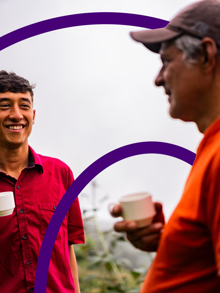 Two people sharing a cup of tea outside - with Clinical Partners brand expression.jpg